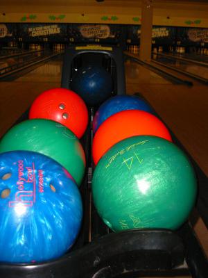 A tricky photo to take with a ball just being returned by the conveyor mechanism.